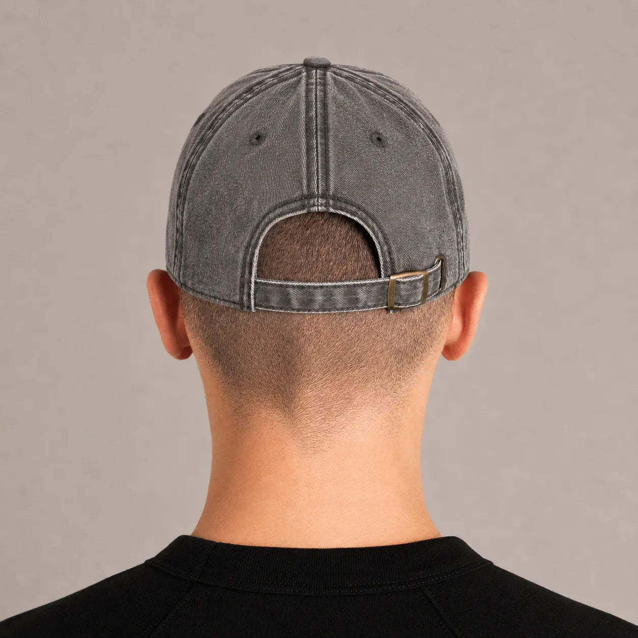 Rear view of the BRTLS Charcoal Grey Presence Vintage Cap showing vintage wash texture and adjustable fit