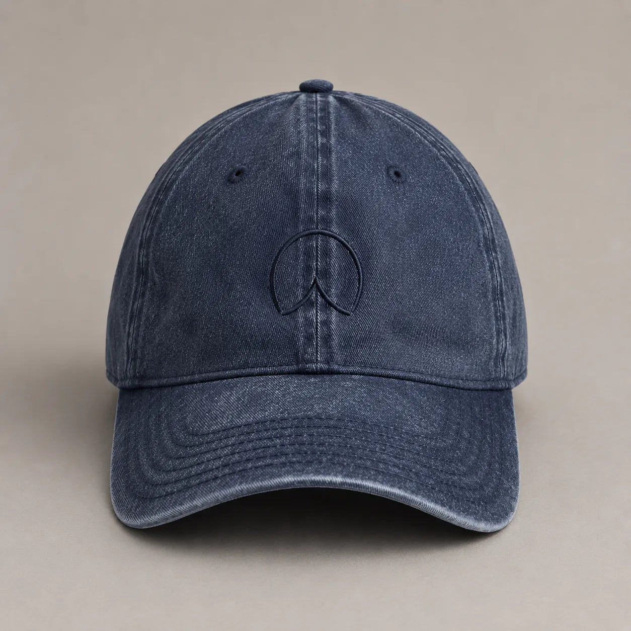 Front view of the BRTLS Navy Presence Vintage Cap with tonal embroidered signature mark