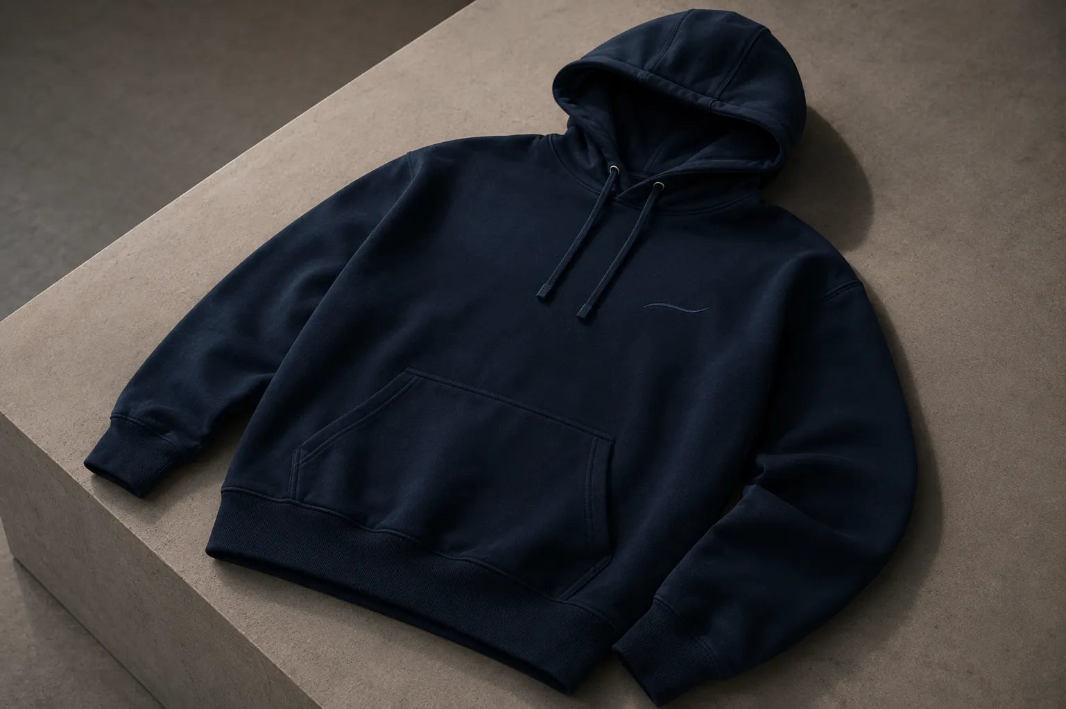 BRTLS Core Navy Hoodie showcasing premium heavyweight cotton construction and minimalist design