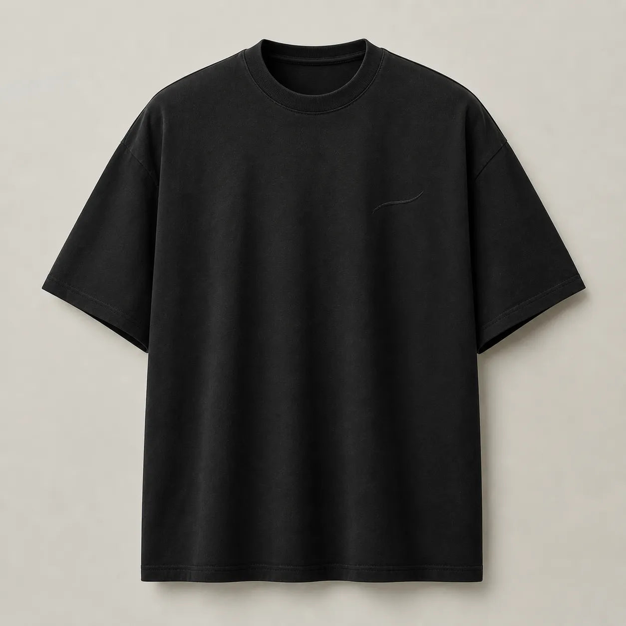 Front view of the BRTLS Core Tee Black featuring premium heavyweight cotton and tonal signature embroidery.