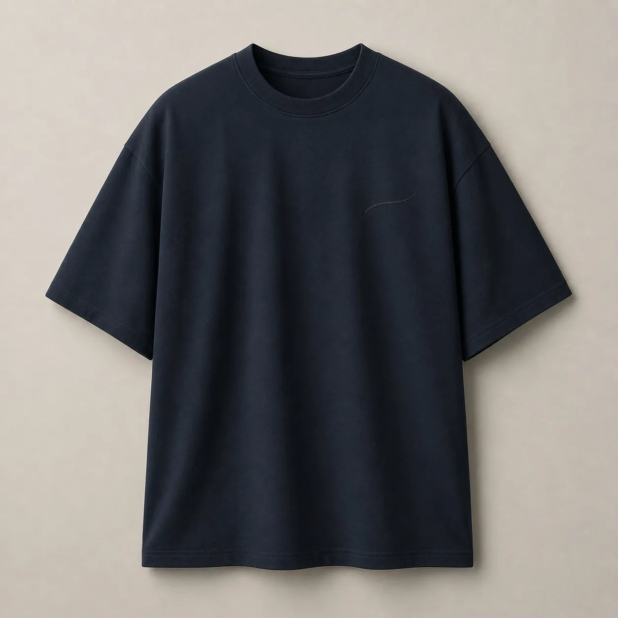 Front view of the BRTLS Core Tee Navy Blazer featuring heavyweight cotton construction and tonal signature embroidery.
