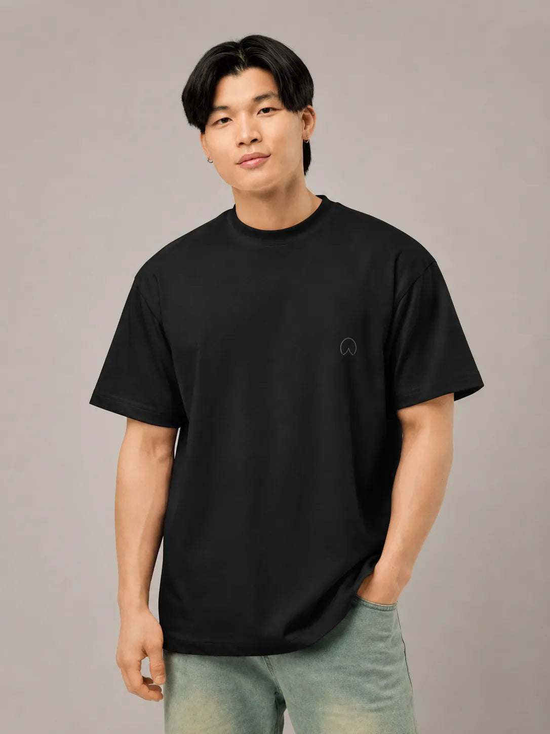 BRTLS Refined Presence Tee Black oversized heavyweight t-shirt with tonal embroidery front detail worn by male model